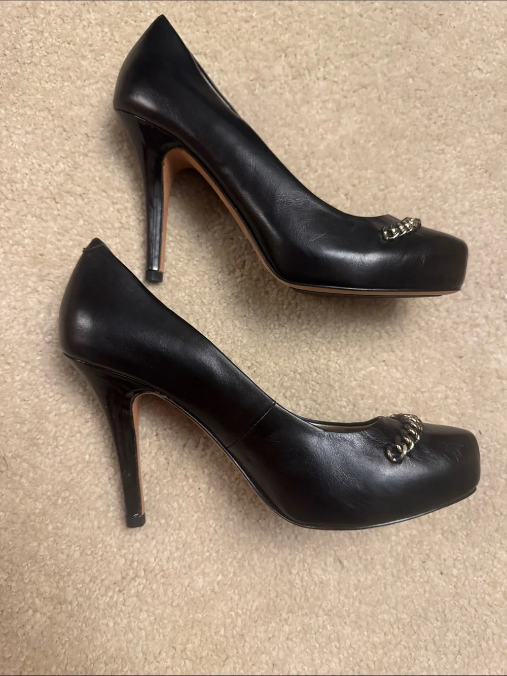 Isola Black Leather Pointed-Toe Pumps with Chain Trim